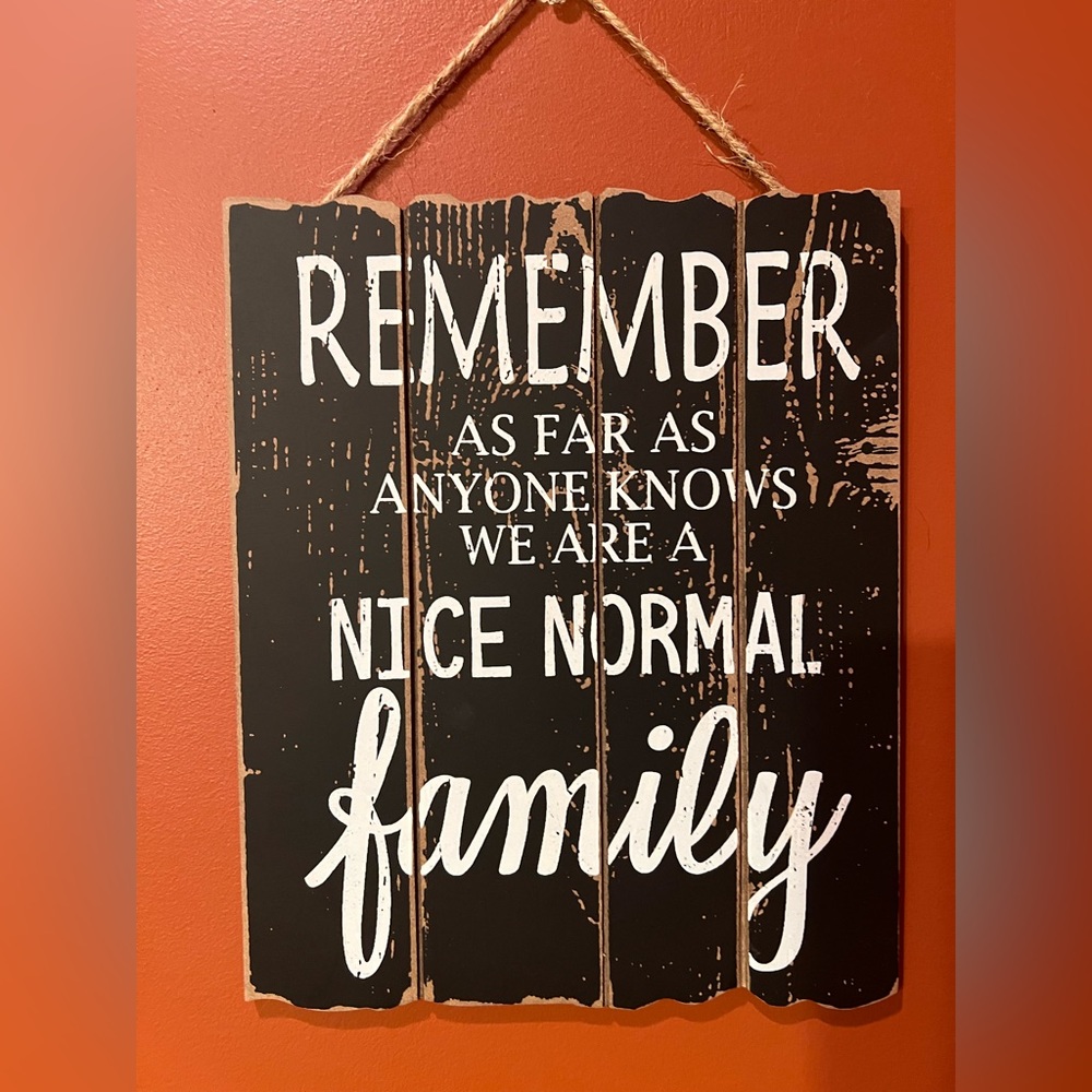 Decorative sign “normal family”